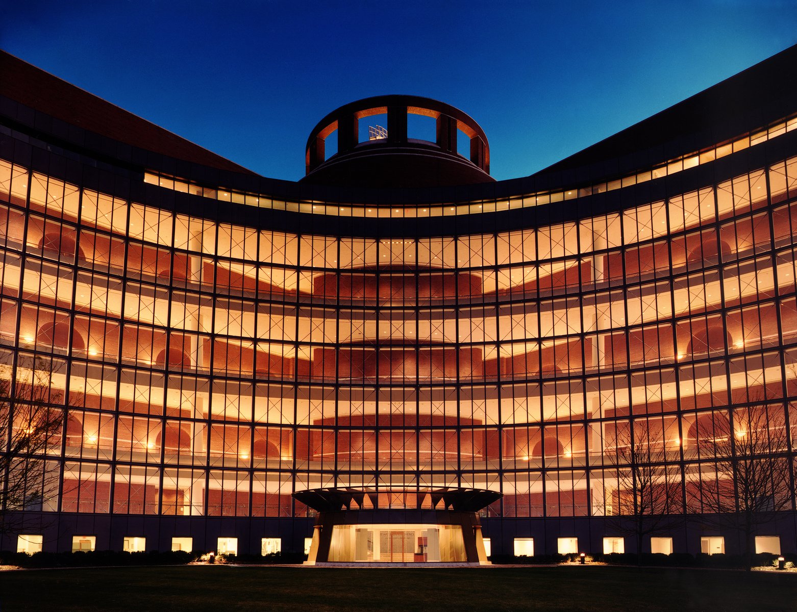 Night time photo of the Moakley Federal Courthouse in Boston